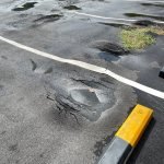Damaged asphalt paving